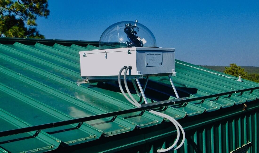 The 70-millimeter Lowell Observatory Solar Telescope is installed on the roof of an auxiliary building near its larger sibling, the 4.3-meter Lowell Discovery Telescope. An 80M optic fiber cable transmits the sunlight from the Solar Telescope to the EXPRES, which ultimately converts the light into useful Doppler data with the aid of the G482-Z50. (Images provided by Lowell Observatory)