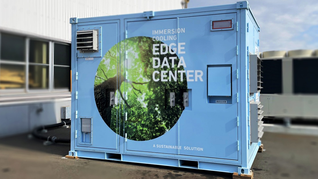 KDDI’s “container-type immersion cooling small data center” is a micro data center housed within a 12ft shipping container. The servers within are cooled with the revolutionary “single-phase immersion cooling” technology, which can help the data center reduce power consumption by 43% and lower the PUE below 1.07.